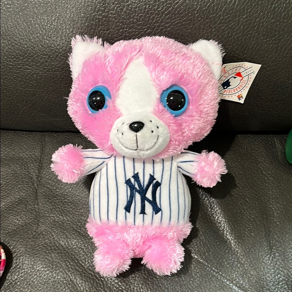 Pink and White Plush NY Yankee stuffed animal with Blue Eyes